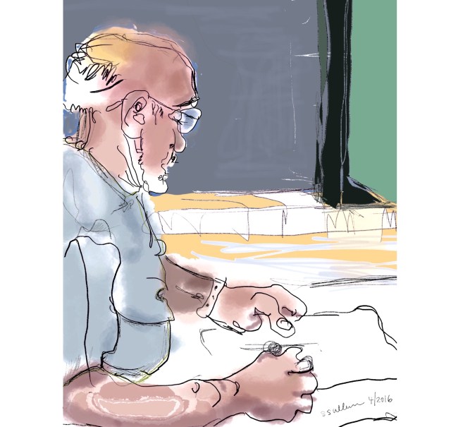Man reading with pencil