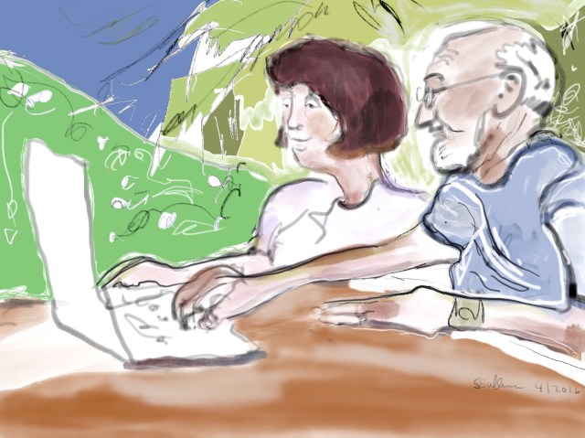 Woman and a man at a computer