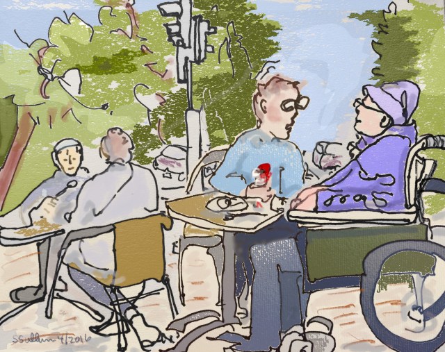 People eating at an outdoor ice cream shop