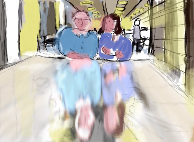 two people sitting side by side